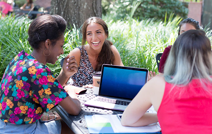 Students studying at a table.