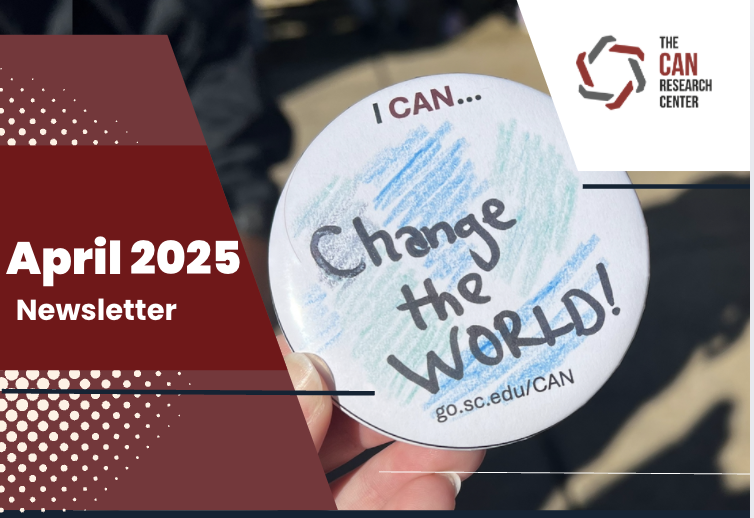 A button with printed text that says "I CAN change the world!"